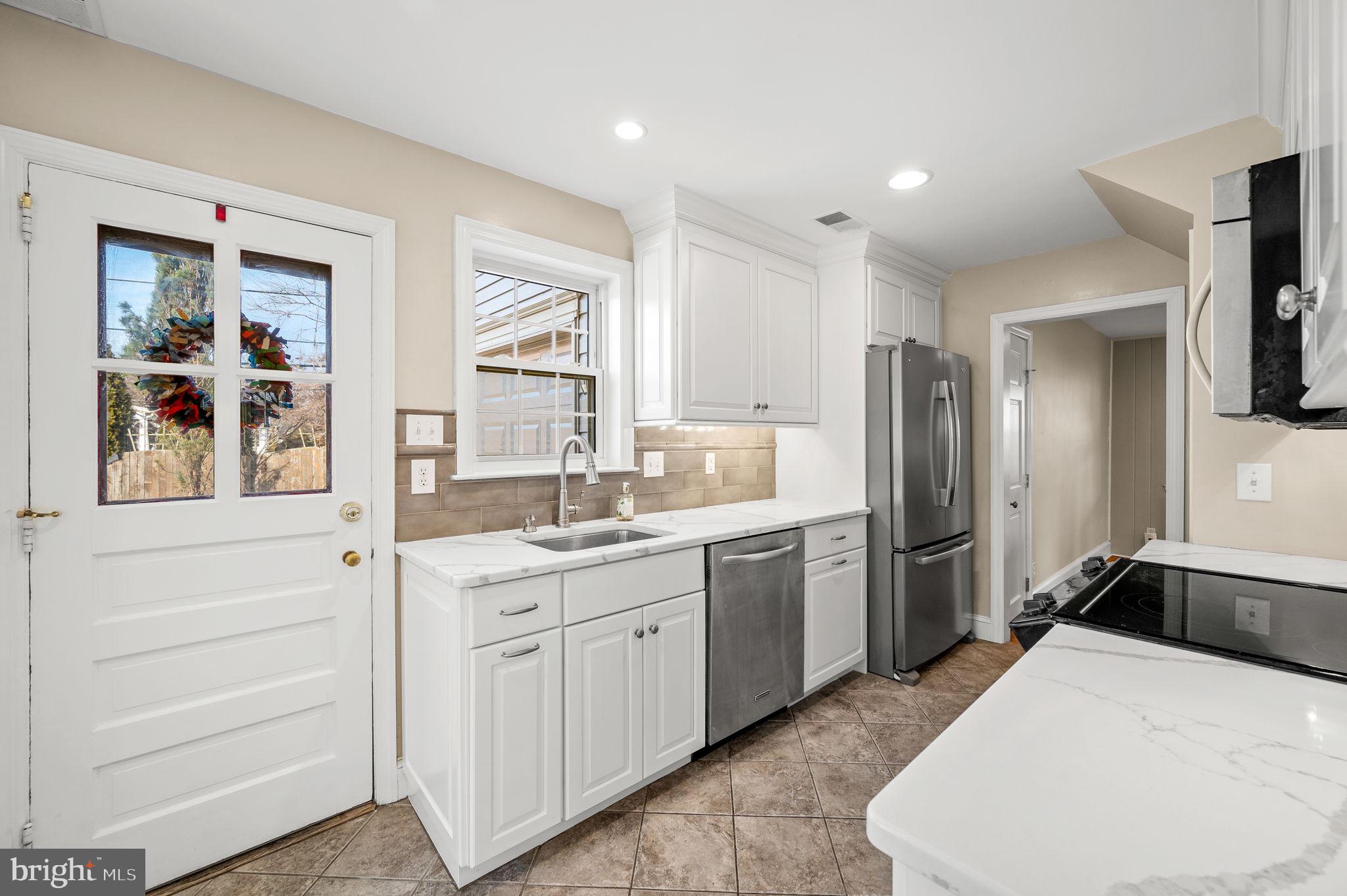 317 Lynbrooke Road Springfield, PA 19064 - Photo 14 of 34 Kitchen with rear access