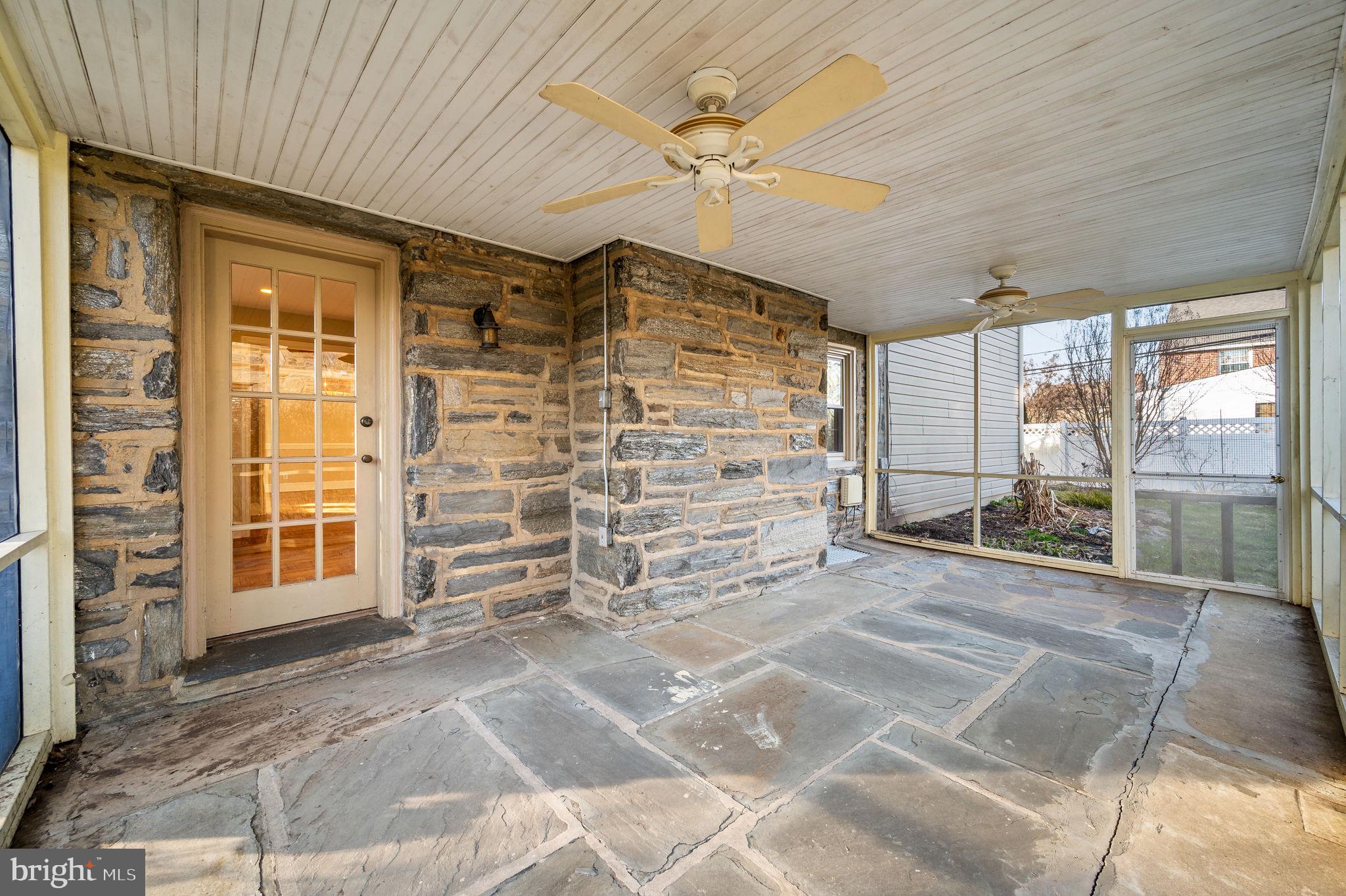 317 Lynbrooke Road Springfield, PA 19064 - Photo 7 of 34 Screened in side porch