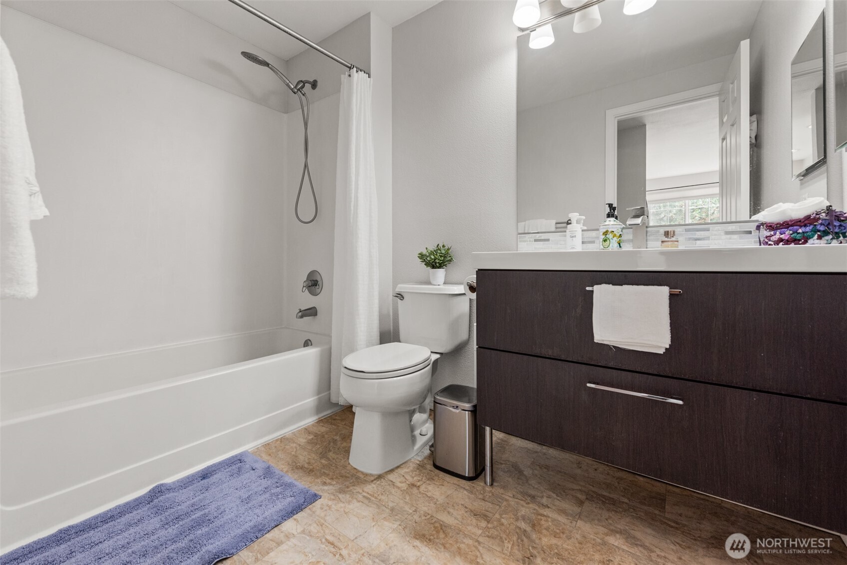 4423 249th Terrace Southeast Issaquah, WA 98029 - Photo 19 of 27 a bathroom with a sink toilet and shower