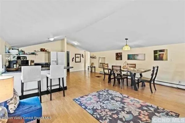 a view of a dining room with furniture