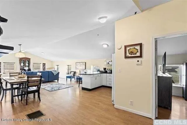 a living room with furniture and a table