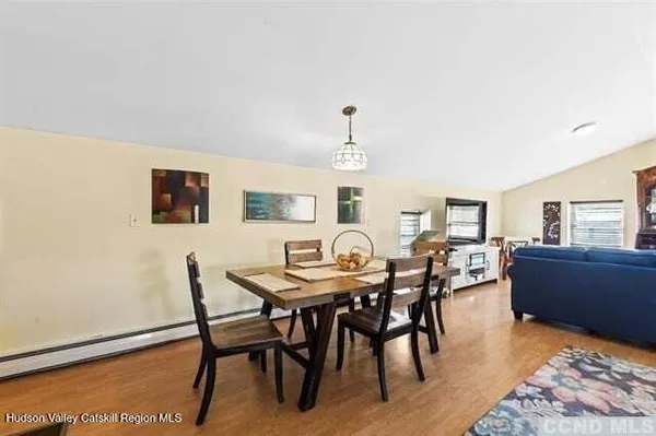 a view of a dining room with furniture