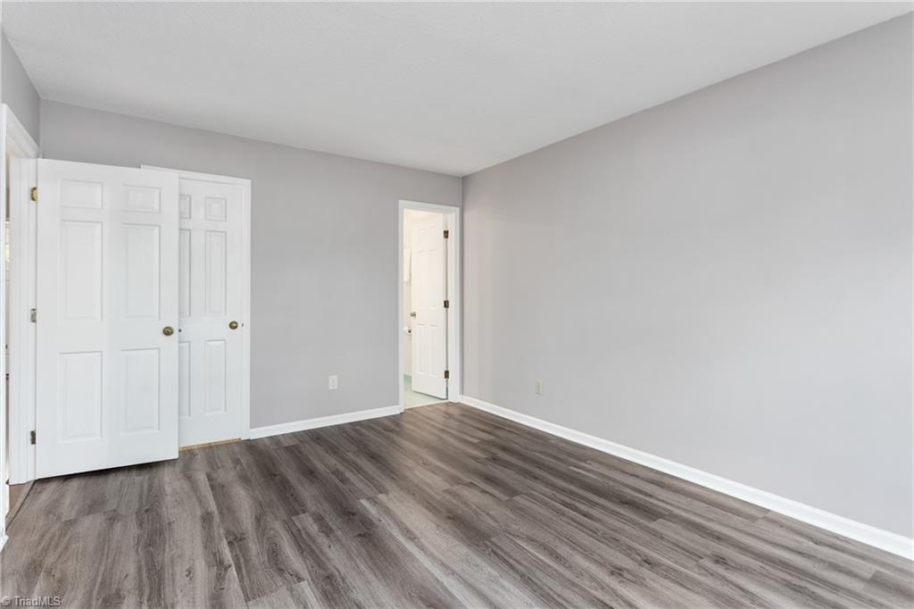 4849 Tower Road, Unit F Greensboro, NC 27410 - Photo 13 of 24 Another view of Primary BR with walk-in closet