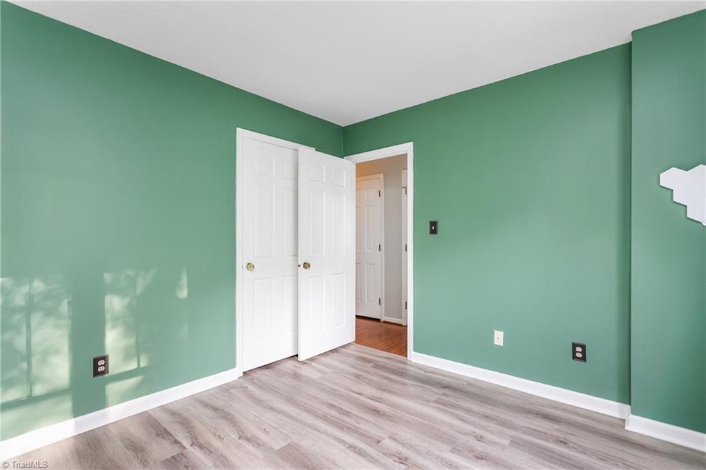 4849 Tower Road, Unit F Greensboro, NC 27410 - Photo 17 of 24 Another view of the second BR. Potential office space