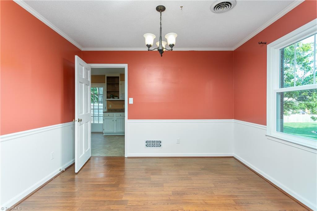 4849 Tower Road, Unit F Greensboro, NC 27410 - Photo 4 of 24 Recently painted Dining Room is perfect for entertaiing