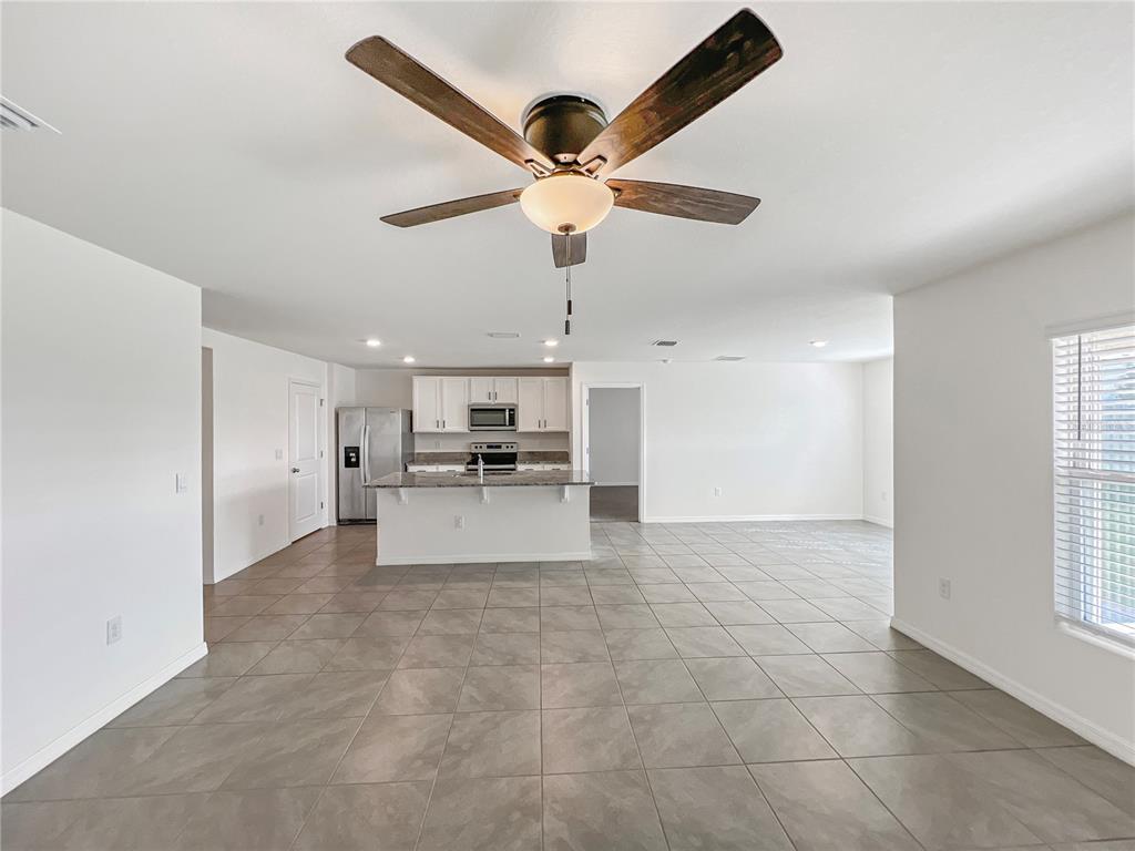 5563 Southwest 43rd Court Ocala, FL 34474 - Photo 11 of 51 a view of kitchen with sink and window