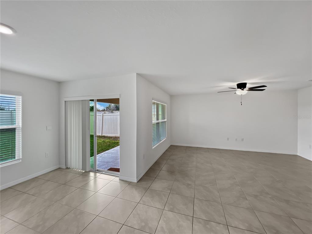 5563 Southwest 43rd Court Ocala, FL 34474 - Photo 12 of 51 a view of an empty room with a window