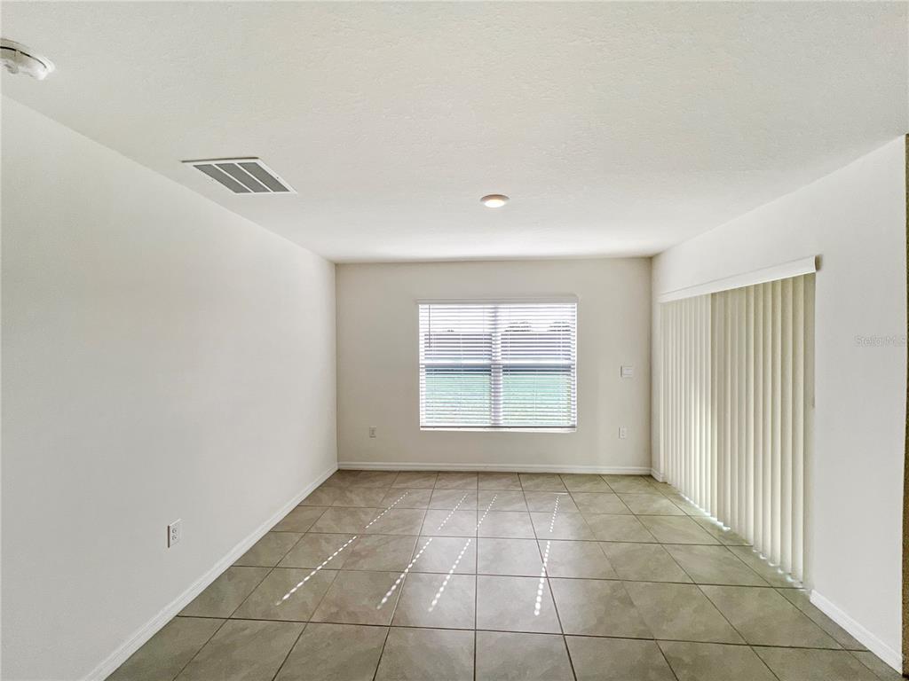 5563 Southwest 43rd Court Ocala, FL 34474 - Photo 20 of 51 a view of an empty room with a window