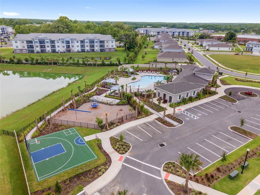 5563 Southwest 43rd Court Ocala, FL 34474 - Photo 44 of 51 an aerial view of a house with a garden