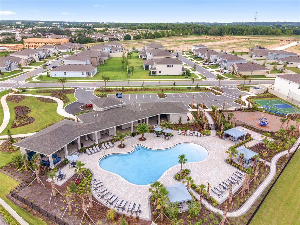 5563 Southwest 43rd Court Ocala, FL 34474 - Photo 49 of 51 an aerial view of a house with a ocean view
