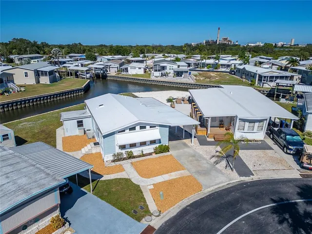 a view of a patio with table and chairs