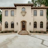a front view of a house with yard