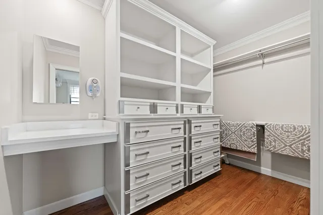 a room with cabinets and stairs