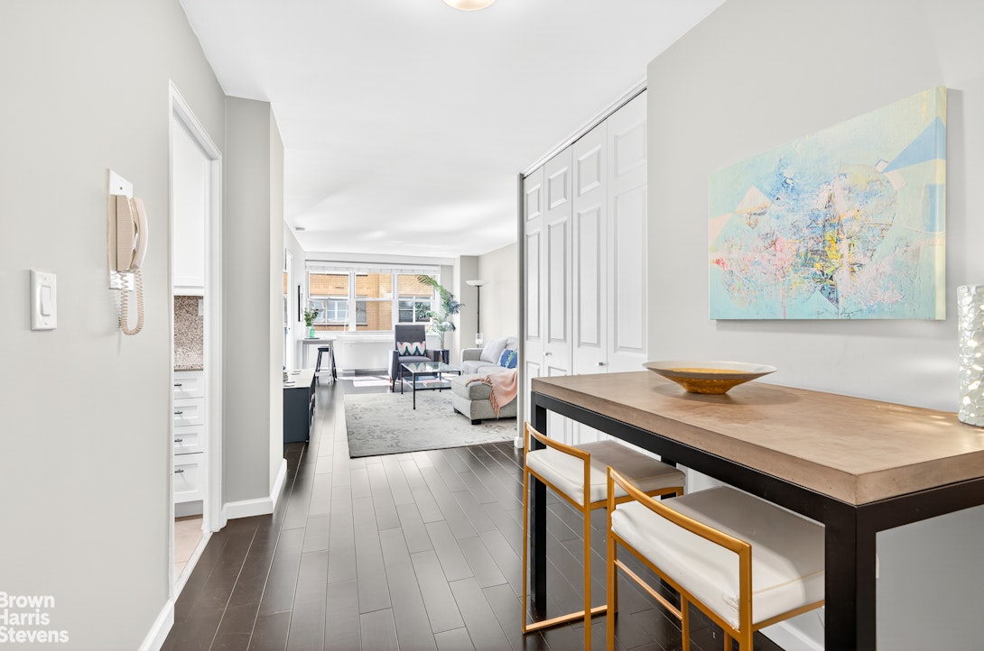 520 East 72nd Street, Unit 5F Manhattan, NY 10021 - Photo 3 of 16 a view of a livingroom with furniture and window