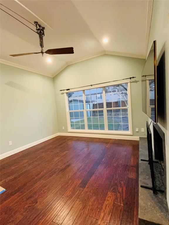 4902 West Mockingbird Lane Dallas, TX 75209 - Photo 5 of 7 a view of a livingroom with wooden floor and a window