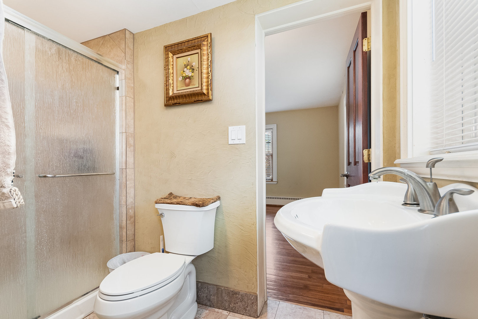 2207 Jericho Road Aurora, IL 60506 - Photo 14 of 18 a bathroom with a sink a toilet and shower
