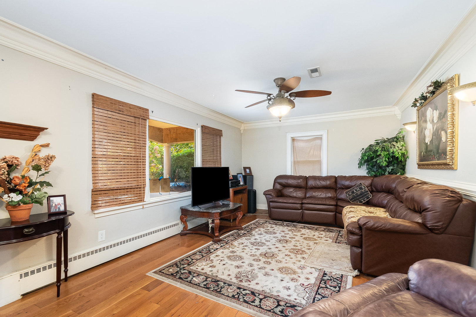 2207 Jericho Road Aurora, IL 60506 - Photo 3 of 18 a living room with furniture flat screen tv and a window