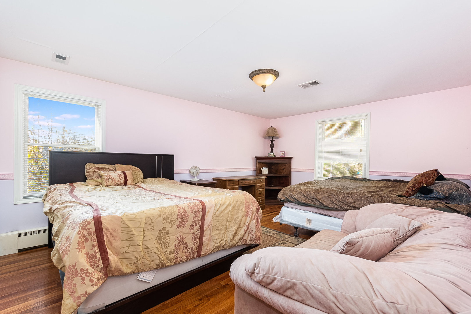2207 Jericho Road Aurora, IL 60506 - Photo 10 of 18 a bedroom with two beds and painting on the wall