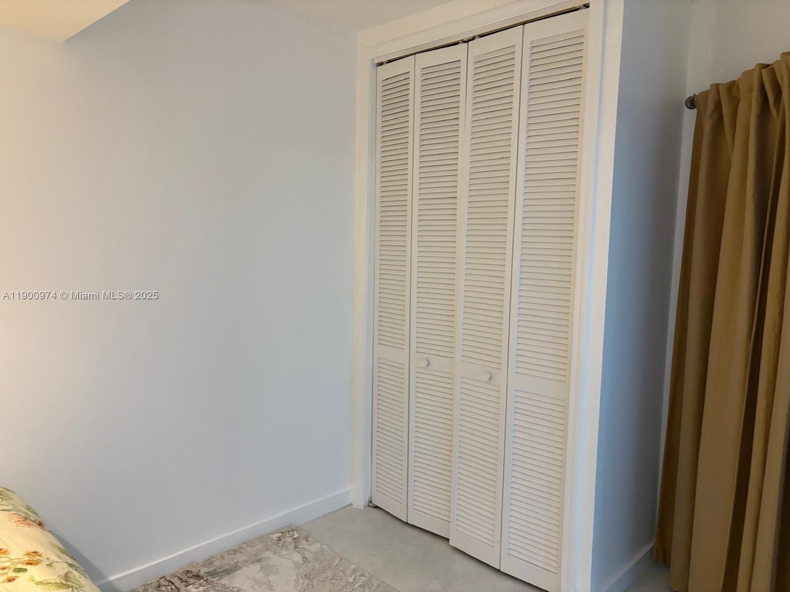 9055 Southwest 73rd Court, Unit 1806 Miami, FL 33156 - Photo 13 of 23 a view of closet area