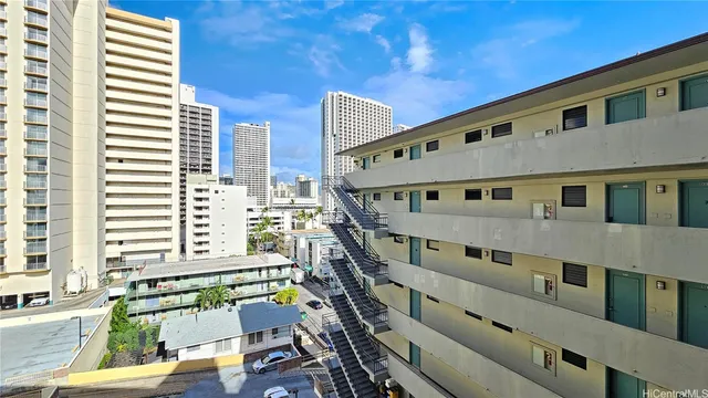 a balcony with furniture and window