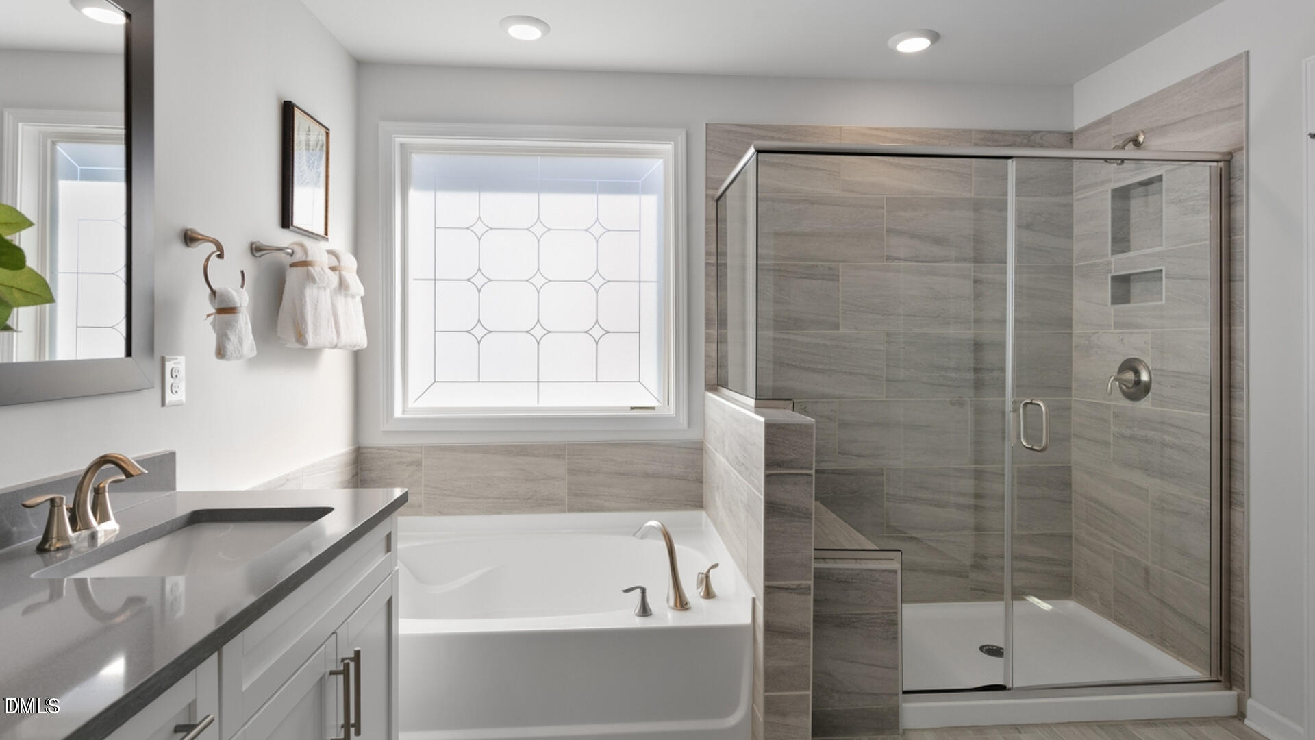 Undisclosed Address Fuquay-Varina, NC 27526 - Photo 18 of 28 a bathroom with a granite countertop sink a toilet and shower