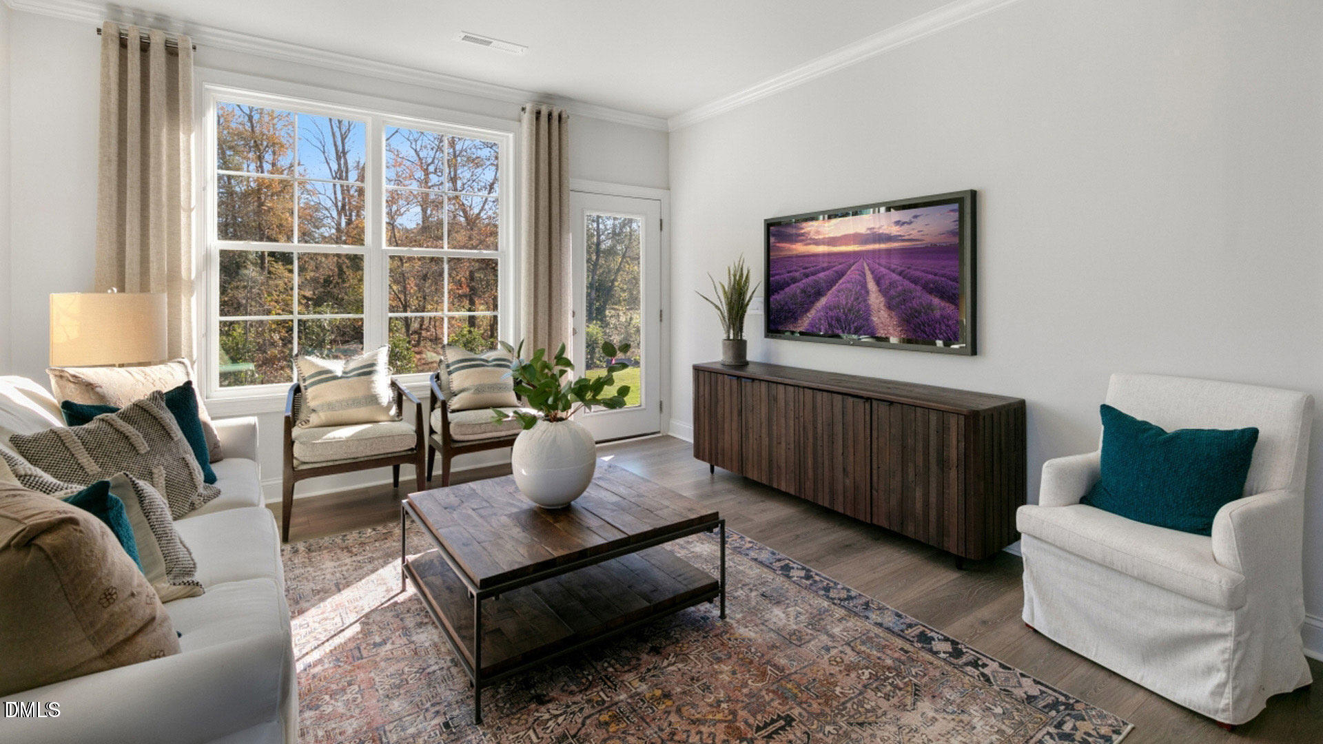 Undisclosed Address Fuquay-Varina, NC 27526 - Photo 4 of 28 a living room with furniture and a potted plant