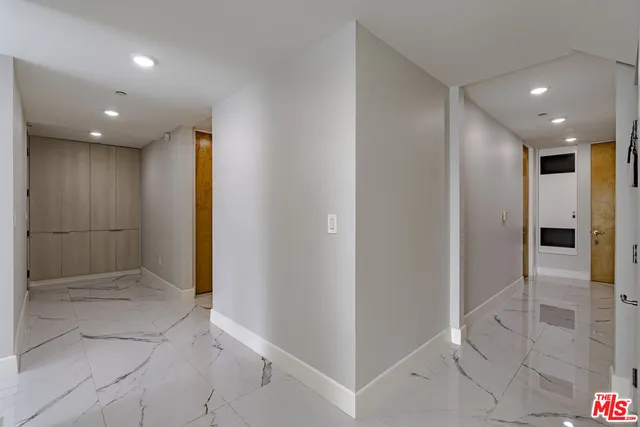 a bedroom with a bed and furniture