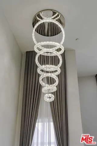 a view of storage and utility room with closet