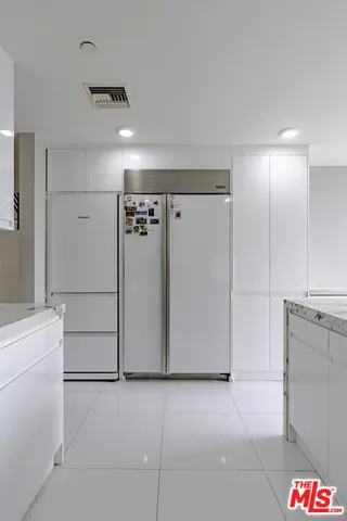 a kitchen with sink and view