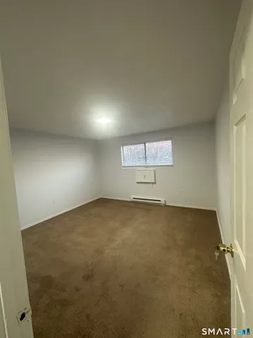 an empty room with a projector