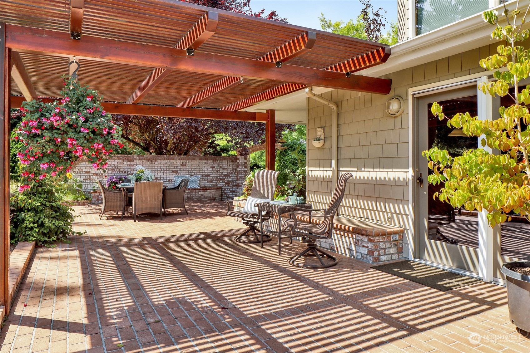1261 Central Road Everson, WA 98247 - Photo 33 of 40 a view of a patio with table and chairs potted plants