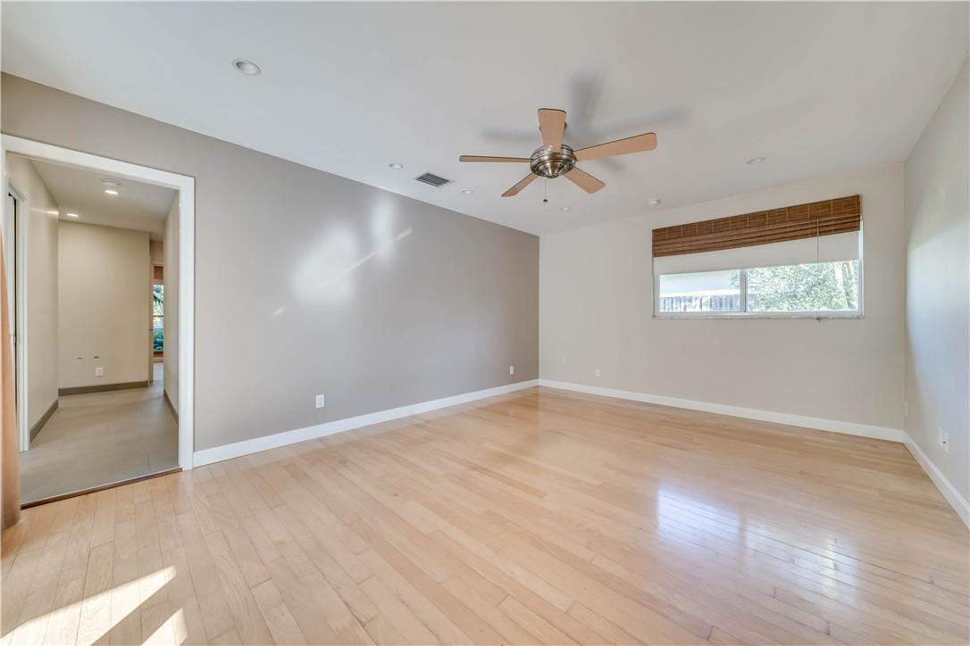 1920 Southwest 67th Terrace Plantation, FL 33317 - Photo 13 of 65 a view of empty room with wooden floor and fan