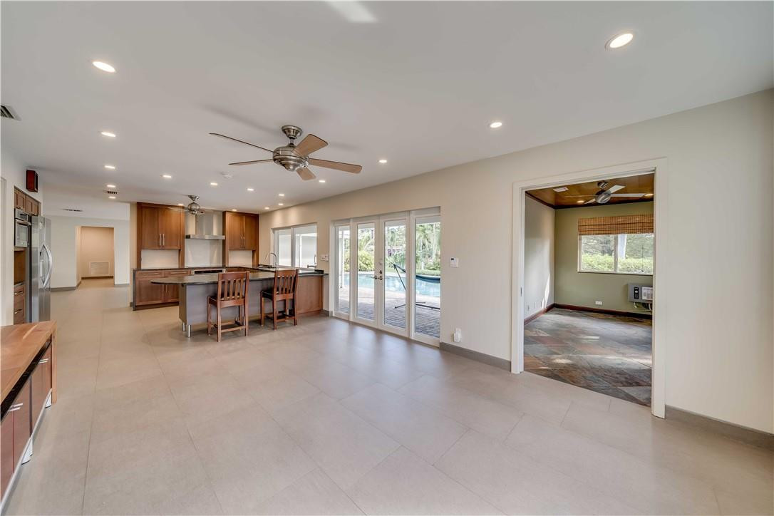 1920 Southwest 67th Terrace Plantation, FL 33317 - Photo 21 of 65 a view of a livingroom with furniture and a ceiling fan