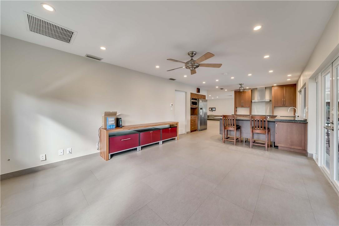 1920 Southwest 67th Terrace Plantation, FL 33317 - Photo 22 of 65 a living room with furniture and a table