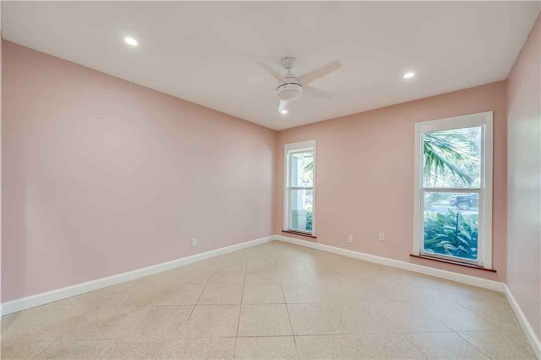 1920 Southwest 67th Terrace Plantation, FL 33317 - Photo 23 of 65 an empty room with windows and fan
