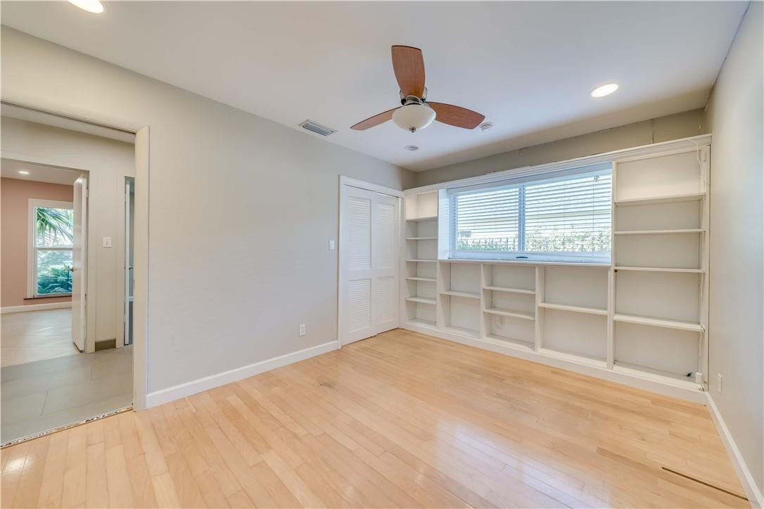 1920 Southwest 67th Terrace Plantation, FL 33317 - Photo 26 of 65 wooden floor in an empty room with a window
