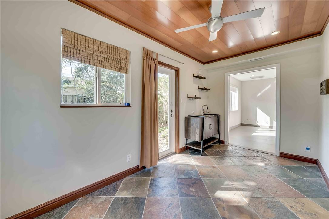 1920 Southwest 67th Terrace Plantation, FL 33317 - Photo 38 of 65 a room with gym equipment and a large window