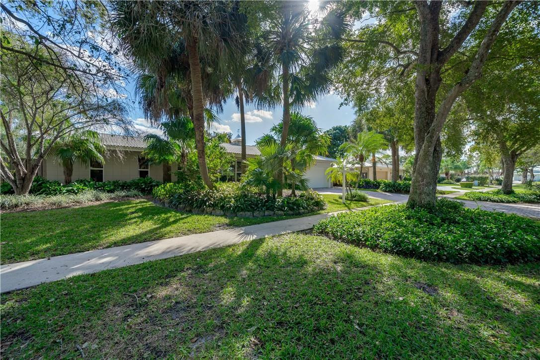 1920 Southwest 67th Terrace Plantation, FL 33317 - Photo 4 of 65 a view of a yard with palm trees