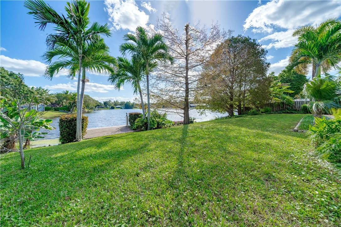1920 Southwest 67th Terrace Plantation, FL 33317 - Photo 50 of 65 a view of a garden with a tree