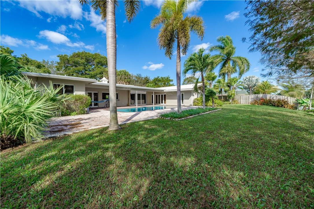 1920 Southwest 67th Terrace Plantation, FL 33317 - Photo 54 of 65 a view of a house with a yard