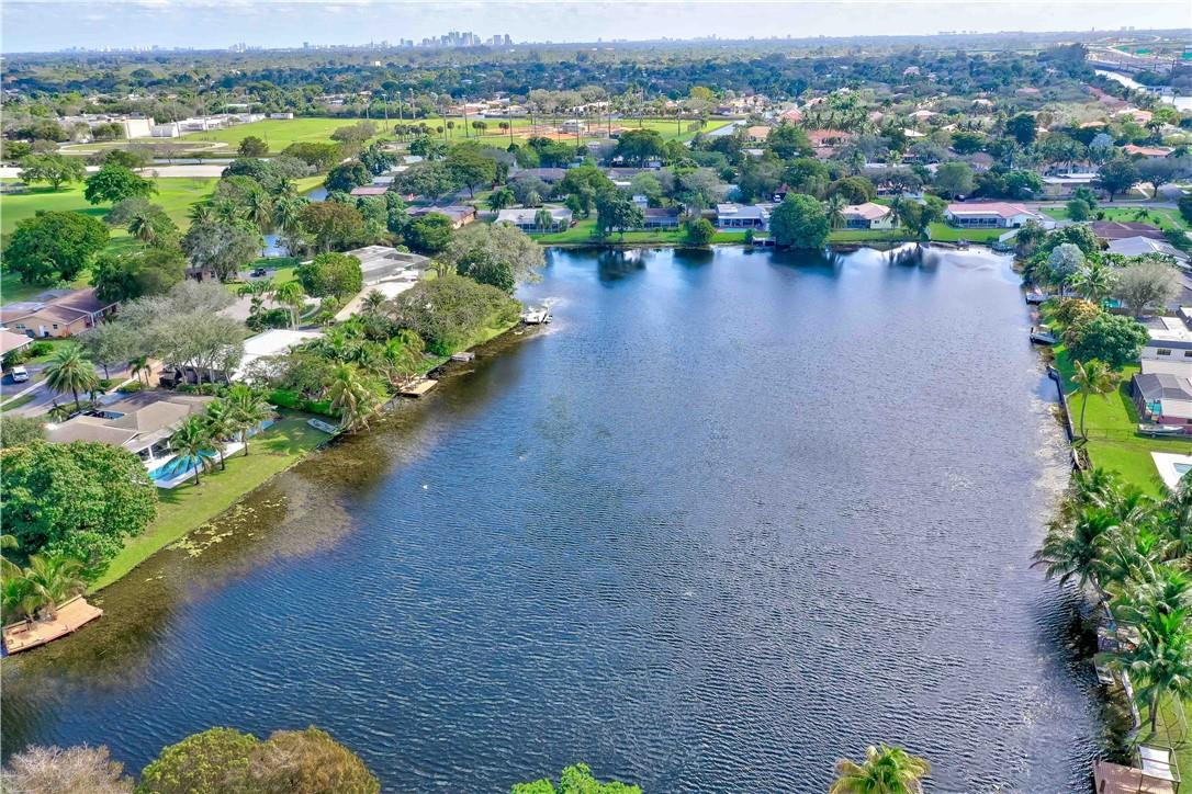 1920 Southwest 67th Terrace Plantation, FL 33317 - Photo 59 of 65 an aerial view of a houses with a lake view