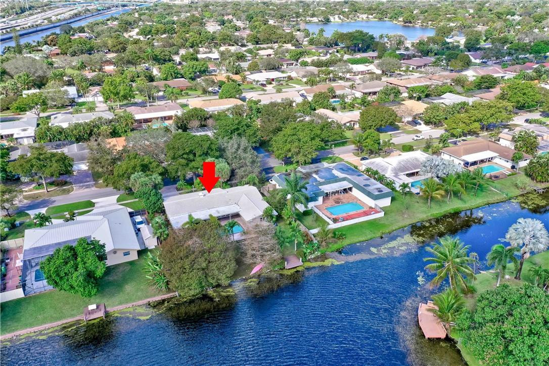 1920 Southwest 67th Terrace Plantation, FL 33317 - Photo 61 of 65 an aerial view of residential houses with outdoor space and street view