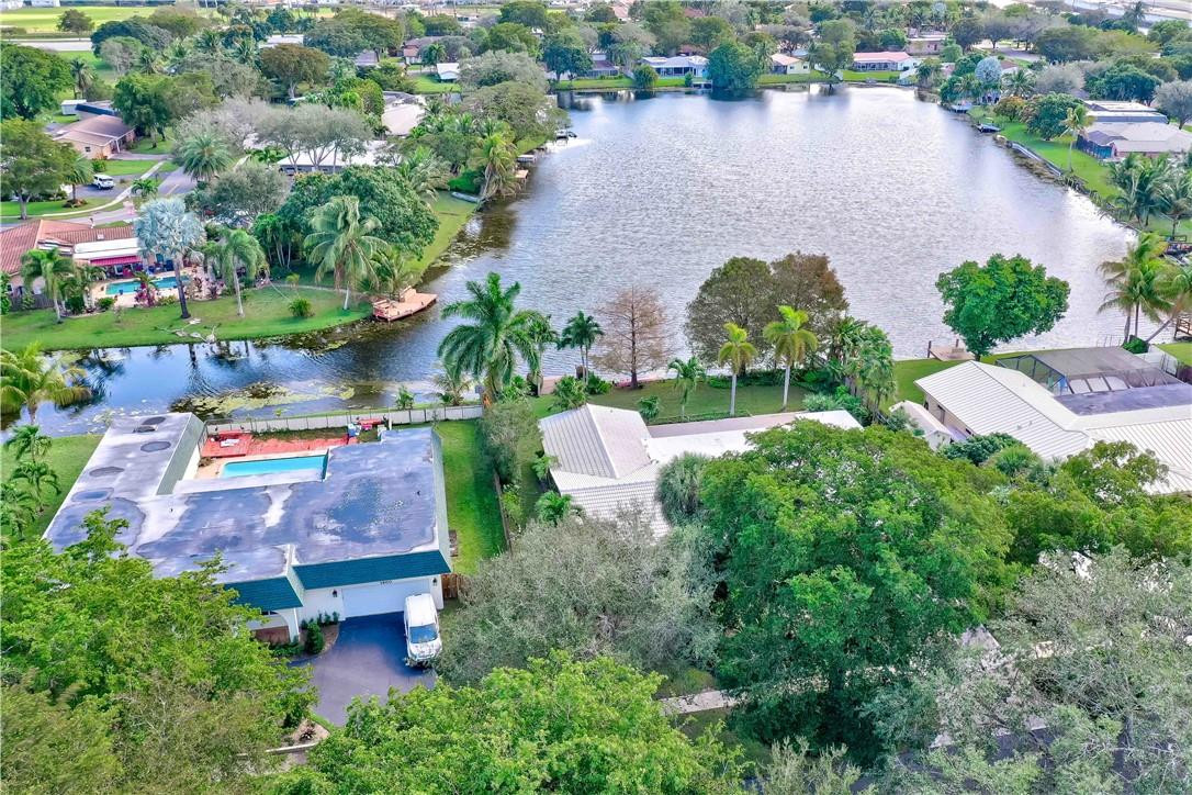 1920 Southwest 67th Terrace Plantation, FL 33317 - Photo 65 of 65 an aerial view of a house with outdoor space and lake view