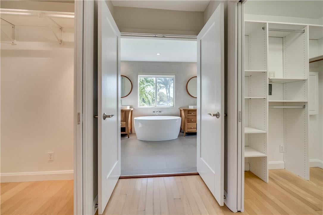 1920 Southwest 67th Terrace Plantation, FL 33317 - Photo 7 of 65 a en suite bathroom with a sink and a mirror