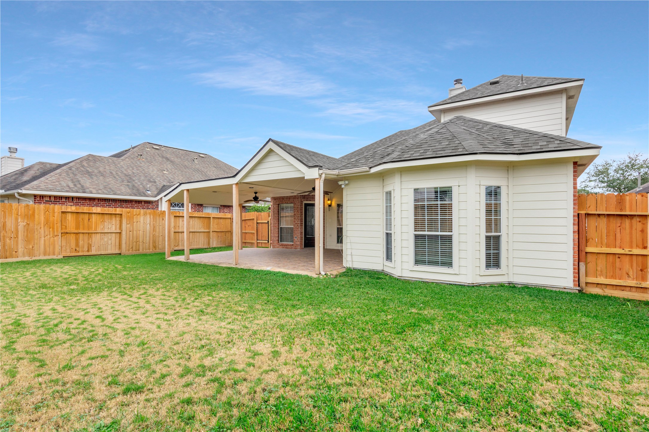 8106 Cove Timbers Lane Tomball, TX 77375 - Photo 24 of 27 Large backyard with fresh fencing, and 4 zone sprinkler system.