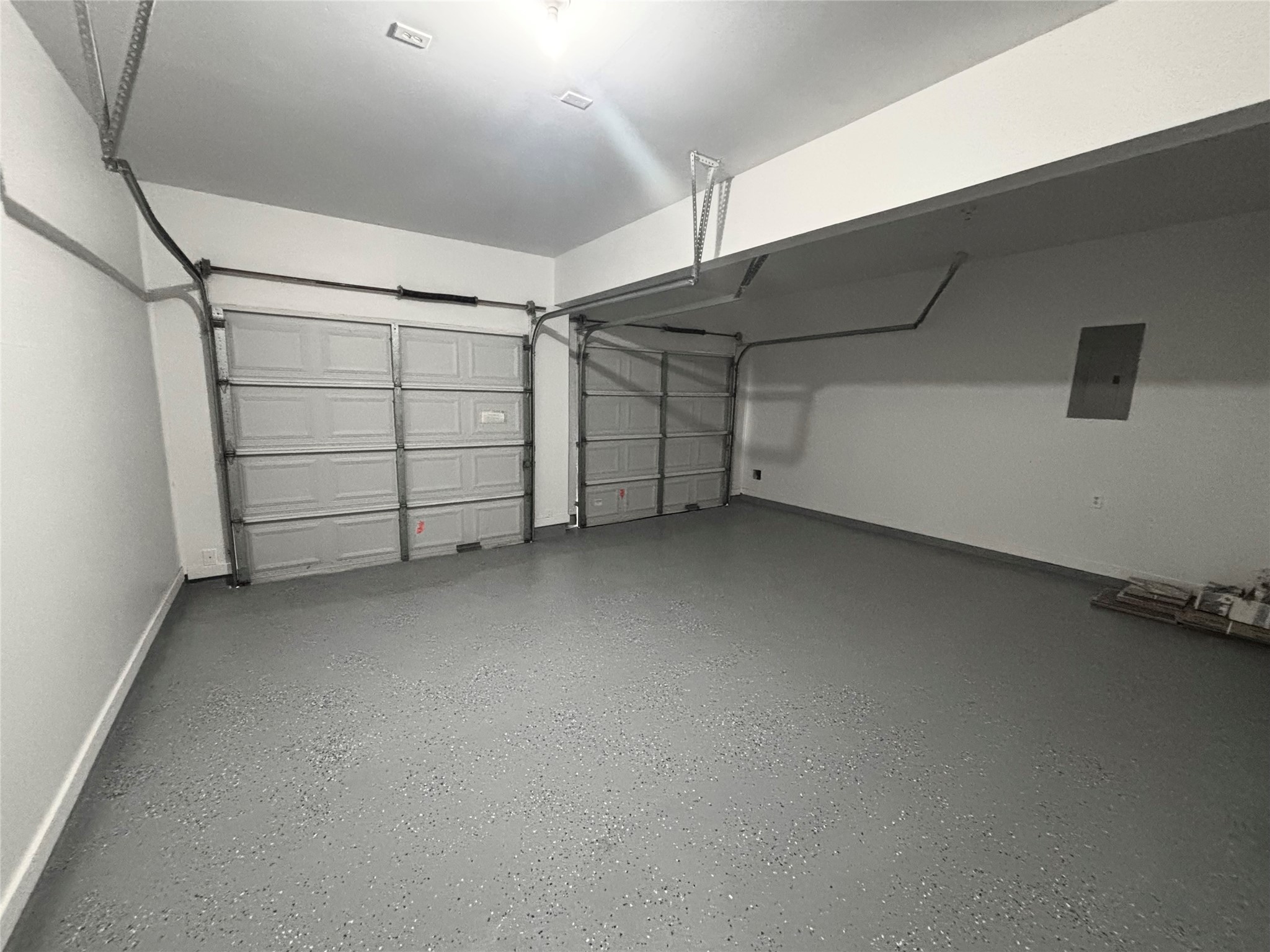 8106 Cove Timbers Lane Tomball, TX 77375 - Photo 27 of 27 Two car garage with epoxy floors ready for its next owner.