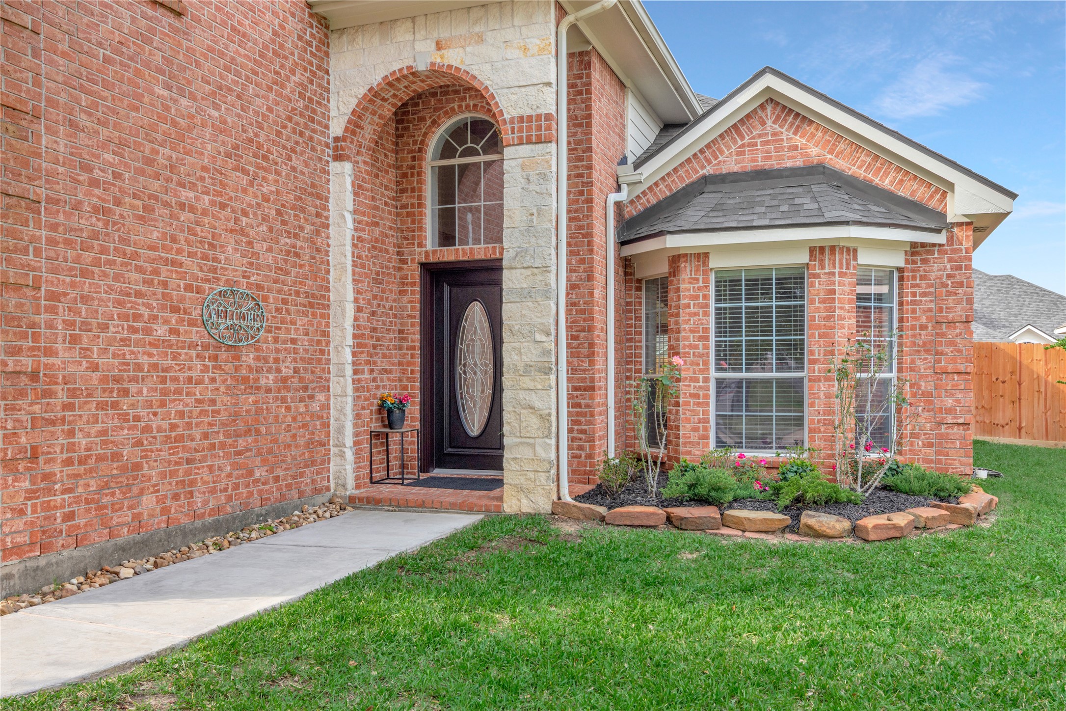 8106 Cove Timbers Lane Tomball, TX 77375 - Photo 3 of 27 Accent rock with beautiful brick front elevation with freshly stained front door.