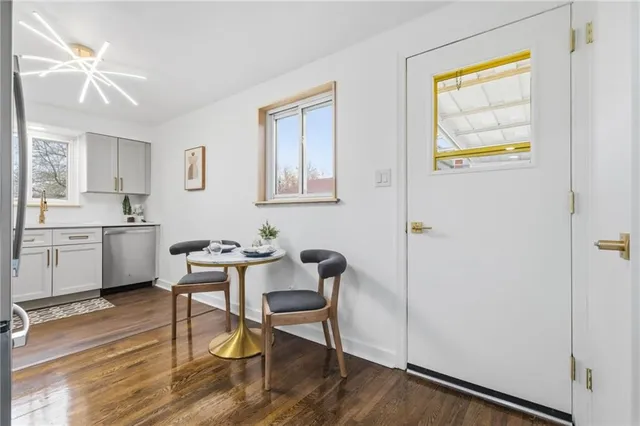 a workspace with furniture and window