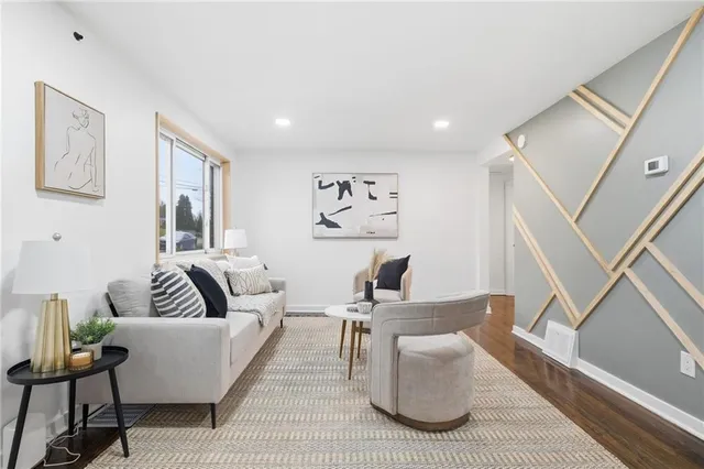 a living room with furniture and a couch