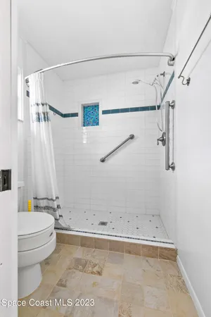 a view of a swimming pool with a balcony